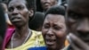 Women grieve during the burial of seven miners, victims of a collapsed mine, at the Ntunga public cemetery in Rwamagana, eastern Rwanda, Jan. 22, 2019. 