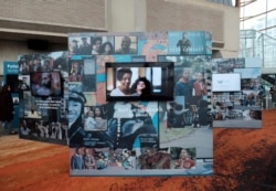 FILE - Advertising for the U.S. Census Bureau's outreach campaign for the 2020 Census is displayed at the Arena Stage in Washington, Jan. 14, 2020.
