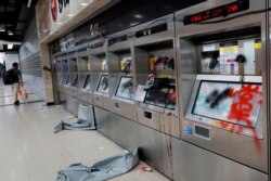 Damaged ticket machines are seen inside Sha Tin MTR station after an anti-government rally at New Town Plaza at Sha Tin, Hong Kong, Sept. 22, 2019