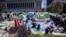 A sign sits erected at the pro-Palestinian demonstration encampment at Columbia University in New York, April 22, 2024.