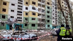 A view shows a residential building, which was damaged by a Russian missile strike, amid Russia's attack on Ukraine, in Sumy, Ukraine, Nov. 18, 2024. 