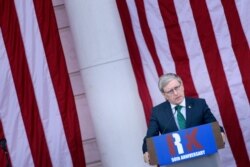 FILE - Daniel Mulhall, Ireland's ambassador of to the U.S., speaks during an event at Arlington National Cemetery in Virginia, June 6, 2018.