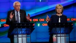 U.S. Senator Bernie Sanders debates former Secretary of State Hillary Clinton during the Democratic presidential candidates debate in Las Vegas, Oct. 13, 2015.