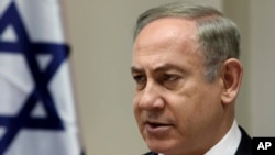 Israeli Prime Minister Benjamin Netanyahu chairs the weekly cabinet meeting in Jerusalem, Feb. 12, 2017. Israel’s prime minister heads to Washington this week for a high-profile meeting with President Donald Trump.