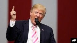 President Donald Trump speaks at a campaign rally in support of Sen. Luther Strange, Friday, Sept. 22, 2017, in Huntsville, Alabama.