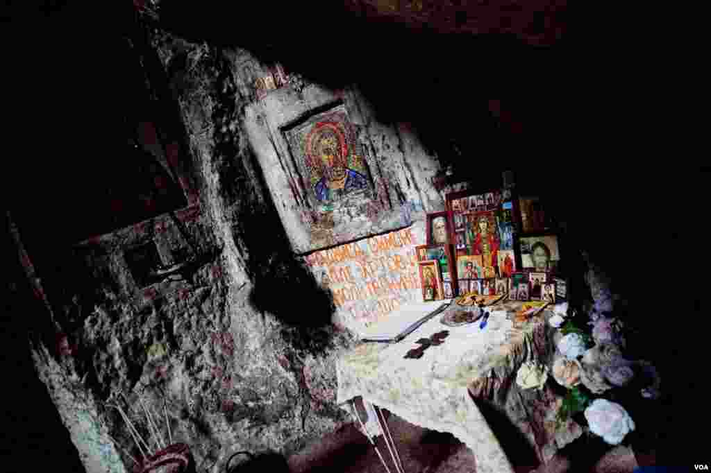 Above the Monastery, Christian pilgrims have left icons in a mountainside grotto, where Simon the Zealot, one of the 12 Apostles, is believed to have lived. (V. Undritz/VOA)