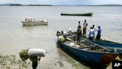FILE - Boats on Lake Victoria in the fishing village of Ggaba, Uganda, Nov. 3, 2006. Tests have confirmed that avian flu is responsible for the mass deaths of wild birds on the shores of Lake Victoria in Uganda.