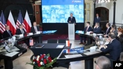 Poland's President Andrzej Duda speaks at a ceremony sealing a long-term deal for Warsaw's purchase of U.S. liquefied gas in Warsaw, Poland, Nov. 8, 2018.