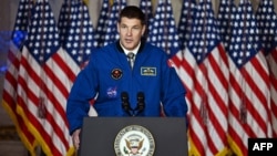 Canadian astronaut and fighter pilot Jeremy Hansen speaks at the U.S. National Space Council meeting in the Andrew W. Mellon Auditorium in Washington on Dec. 20, 2023.