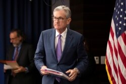 Federal Reserve Chairman Jerome Powell walks to the podium during a news conference in Washington, July 31, 2019.