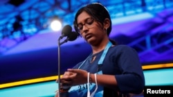 Harini Logan, 14, from San Antonio, Texas, participates in the final round on her way to winning the annual Scripps National Spelling Bee held at National Harbor in Oxon Hill, Maryland, U.S., June 2, 2022. (REUTERS/Jonathan Ernst)