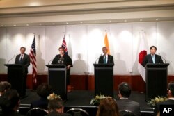 Menteri Luar Negeri AS Antony Blinken, Menteri Luar Negeri Australia Marise Payne, Menteri Luar Negeri India S. Jaishankar, dan Menteri Luar Negeri Jepang Yoshimasa Hayashi dalam konferensi pers empat menteri luar negeri di Melbourne, Jumat, 11 Februari 2022. (Foto: AP)
