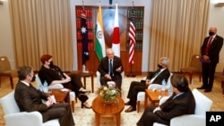 From left, U.S. Secretary of State Antony Blinken and officials Marise Payne of Australia, Scott Morrison of Australia, S. Jaishankar of India and Yoshimasa Hayashi of Japan meet in Melbourne, Feb. 11, 2022.