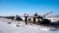 In this photo taken from video and provided by the Russian Defense Ministry Press Service Feb. 15, 2022, Russian army tanks stand in formation after drills in Russia. 