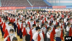 This Feb. 11, 2022, photo from North Korea's official Korean Central News Agency (KCNA) shows the Korean Children's Union of the Central Committee of the Socialist Patriotic Youth League performing to mark the 80th birthday of former leader Kim Jong Il in Pyongyang.