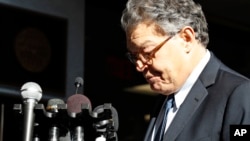 Sen. Al Franken, D-Minn., pauses while speaking to the media on Capitol Hill, Nov. 27, 2017, in Washington.