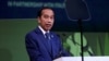 FILE - Indonesian President Joko Widodo is president of this year’s Group of 20 (G-20) economic forum.  Ukrainian President Volodymyr Zelenskyy tweeted that Widodo had invited him to the G-20 summit in Bali in November.