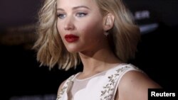 Cast member Jennifer Lawrence poses at the premiere of "The Hunger Games: Mockingjay - Part 2" in Los Angeles, California Nov. 16, 2015. 