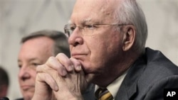 Senate Judiciary Committee Chairman Sen. Patrick Leahy, D-Vt., right, listens to testimony on Capitol Hill in Washington, during the committee's hearing examining the validity of the national health care law under the Constitution, February 02, 2011.
