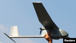 FILE - A Raven drone is pictured at the U.S. military base in Vilseck-Grafenwoehr, Germany, Oct. 8, 2013. 
