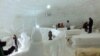 Inside view of igloo cafe with seats covered by sheepskin in Gulmarg. (Bilal Hussain/VOA)