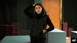 Women's rights activist Najeeba Hayat poses for a portrait in Kuwait City, Feb. 9, 2022.