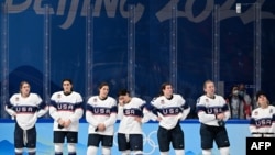 Silver medalists USA attend the victory ceremony of the women's ice hockey competition during the Beijing 2022 Winter Olympic Games at the Wukesong Sports Center in Beijing on Feb. 17, 2022.