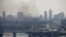 Smoke rises from the territory of the Ukrainian Defense Ministry's unit, after Russian President Vladimir Putin authorized a military operation in eastern Ukraine, in Kyiv, Feb. 24, 2022. 