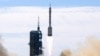 FILE - A Long March-2F Y12 rocket carrying a crew of Chinese astronauts in a Shenzhou-12 spaceship lifts off at the Jiuquan Satellite Launch Center in Jiuquan, China, June 17, 2021.