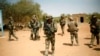 FILE - French soldiers secure the area at the entrance of Gao, northern Mali, on Feb. 10, 2013.