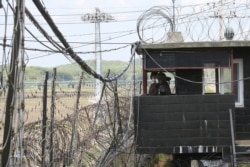South Korean army soldiers stand guard at a military post at the Imjingak Pavilion near the border village of Panmunjom in Paju, South Korea, May 2, 2021.