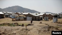 FILE - Eritrean refugee children play within the Hitsats refugee camp, in Tigray region, Ethiopia, Nov. 9, 2017. The U.N. refugee agency said March 2021 that the Shimelba and Hitsats camps had been destroyed.