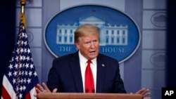 FILE - President Donald Trump speaks about the coronavirus in the James Brady Press Briefing Room of the White House in Washington, April 22, 2020. 