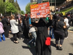 A female demonstrator denounces the abuse of women during a protest in Johannesburg, Sept. 13, 2019. (T.Khumalo/VOA)