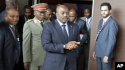 Democratic Republic of Congo President Joseph Kabila arrives for a southern and central African leaders' meeting to discuss the political crisis his country, in Luanda, Angola, Oct. 26, 2016. The U.S. and EU have imposed sanctions on nine DRC officials who allegedly have been enabling Kabila to prolong his term in office.