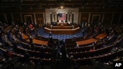FILE - President Joe Biden speaks to a joint session of Congress, April 28, 2021.