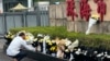 China clears memorial to mass killing victims as government scrambles to respond