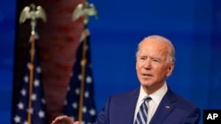 President-elect Joe Biden speaks during an event to announce his choice of retired Army Gen. Lloyd Austin to be secretary of defense, at The Queen theater in Wilmington, Del., Dec. 9, 2020.