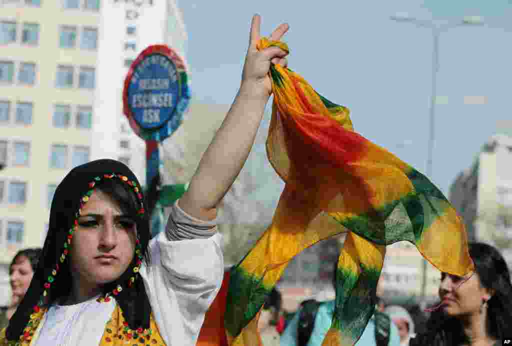 Turkish Kurdish women protest domestic violence against women, war and discrimination as they march to commemorate the International Women's Day in Ankara, Turkey, March 8, 2013.