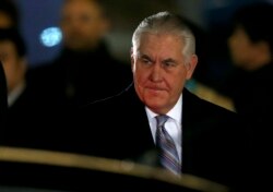 FILE - U.S. Secretary of State Rex Tillerson arrives at Haneda international airport in Tokyo, March 15, 2017.