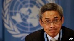 FILE - Then-U.N. human rights investigator Vitit Muntarbhorn gestures during a press conference at United Nations headquarters in Geneva, Switzerland, March 15, 2010.