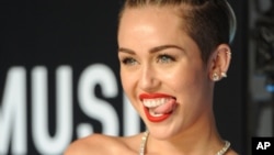 Singer Miley Cyrus seems like she would be good at tongue-in-cheek humor. Here, she is at the 2013 MTV Video Music Awards. (Photo Evan Agostini/Invision/AP)