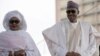 Le président nigérian Muhammadu Buhari arrive avec sa femme Aisha, avant de prêter serment sur la place Eagles à Abuja, le 29 mai 2015.