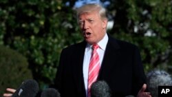 FILE - President Donald Trump speaks to reporters at the White House, Nov. 21, 2017.