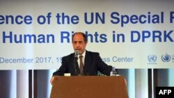 North Korean defector Kim Ryon-Hui (C) speaks to reporters during a press conference by Tomas Ojea Quintana, the UN's Special Rapporteur on human rights in North Korea, in Seoul on Dec. 14. 2017.