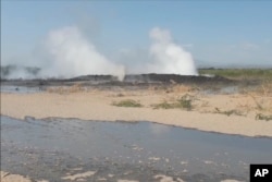 In this image taken from video, steam is released near volcanic activity in the Sagento Kebele village, Afar region, Ethiopia, on Jan. 4, 2025.