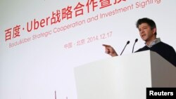 Uber CEO Travis Kalanick speaks during the Baidu and Uber strategic cooperation and investment signing ceremony at Baidu's headquarters in Beijing, December 17, 2014.