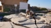 Iraqi archaeologists piece together ancient treasures ravaged by IS 