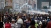 Angry Venezuela Protesters Take Aim at Chavez Statues, Home