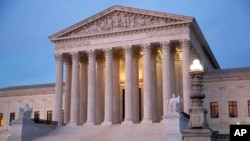 FILE - The U.S. Supreme Court building at dusk on Capitol Hill in Washington. 